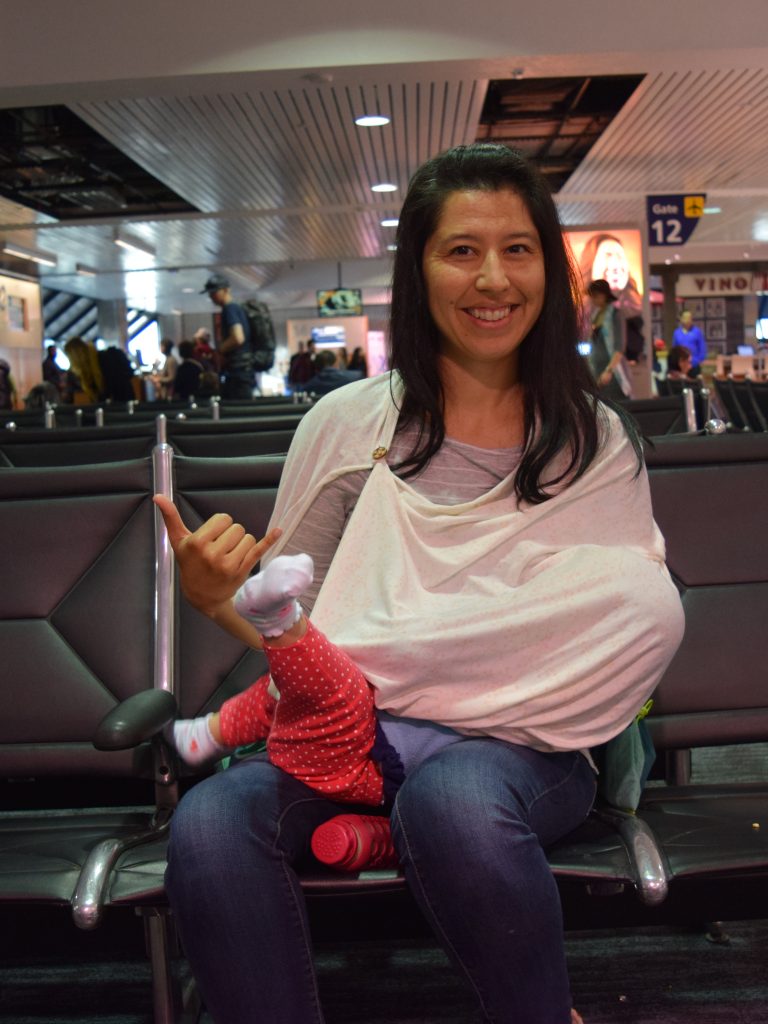 Everything You Need to Know to Breastfeed in Public (Tips for Nursing While Traveling)