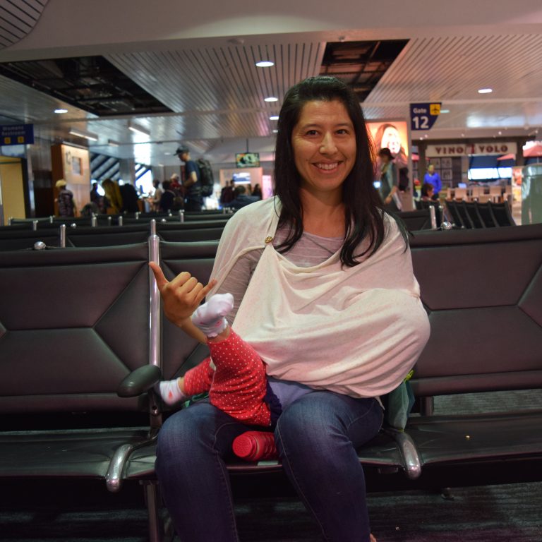 Everything You Need to Know to Breastfeed in Public (Tips for Nursing While Traveling)