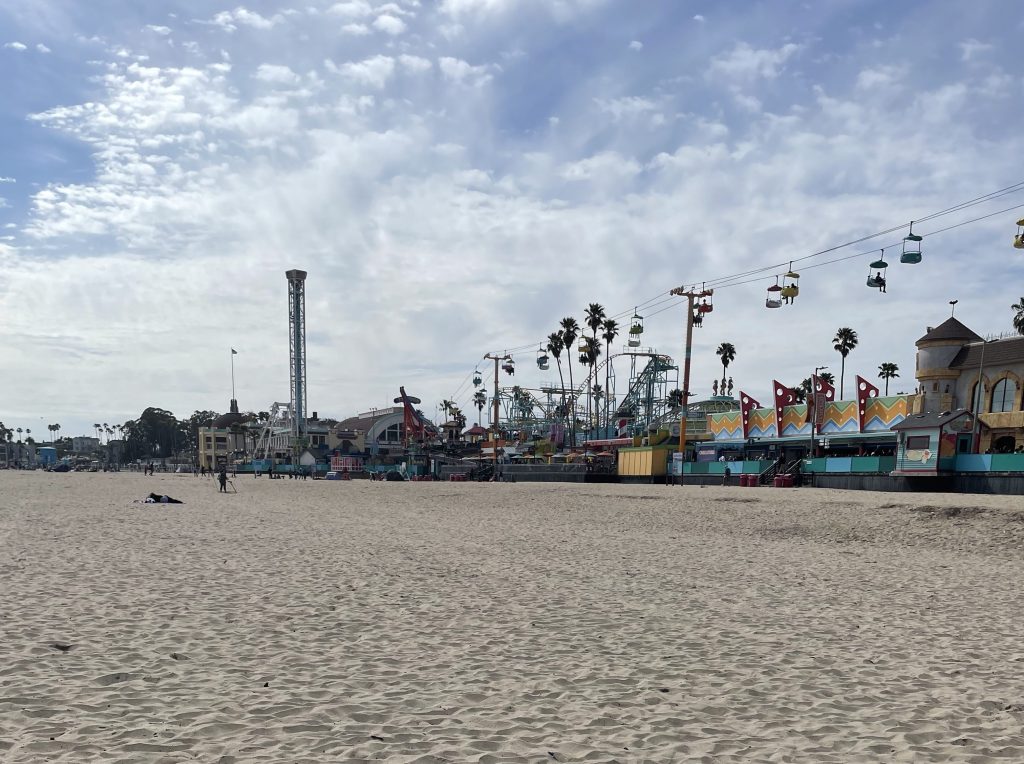 Blue skies with some white clouds above the Santa Cruz Beach Boardwalk