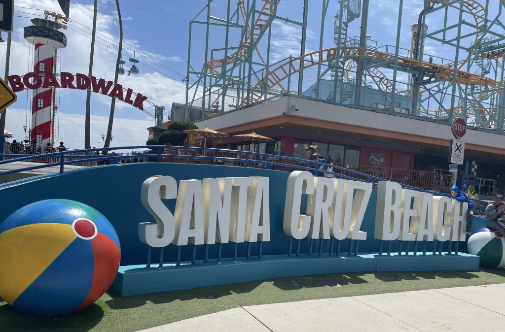 Santa Cruz Beach Boardwalk sign and roller coaster