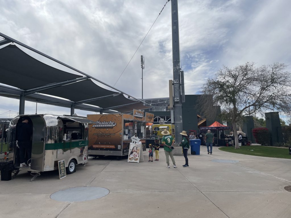 Food trucks in the sun at Hohokam stadium in Mesa Arizona for Oakland Athletics Spring Training