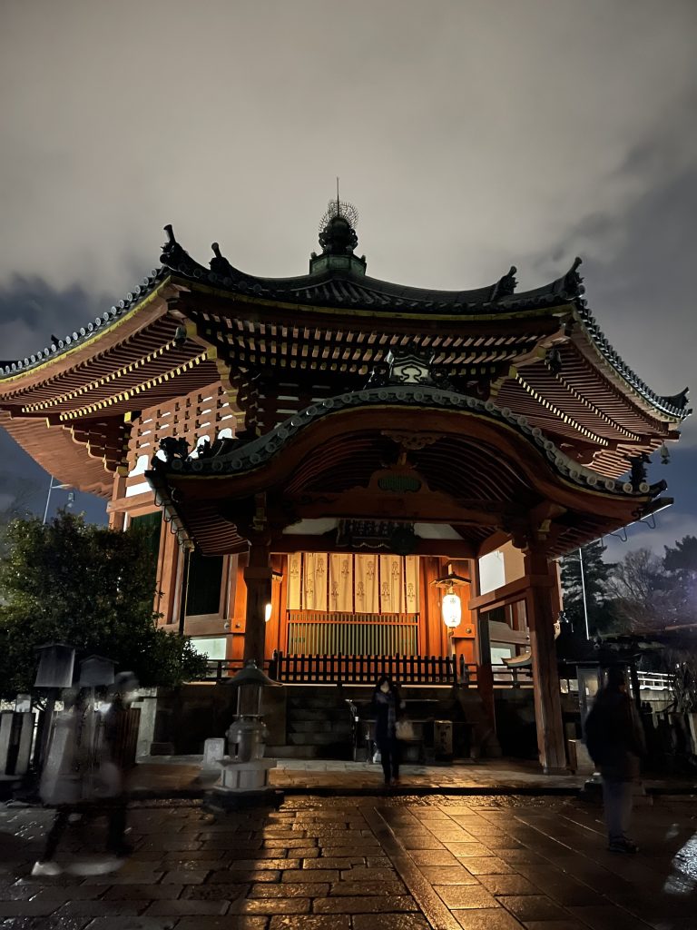 A night shot of a cylindrical Japanese temple in Nara, Japan.