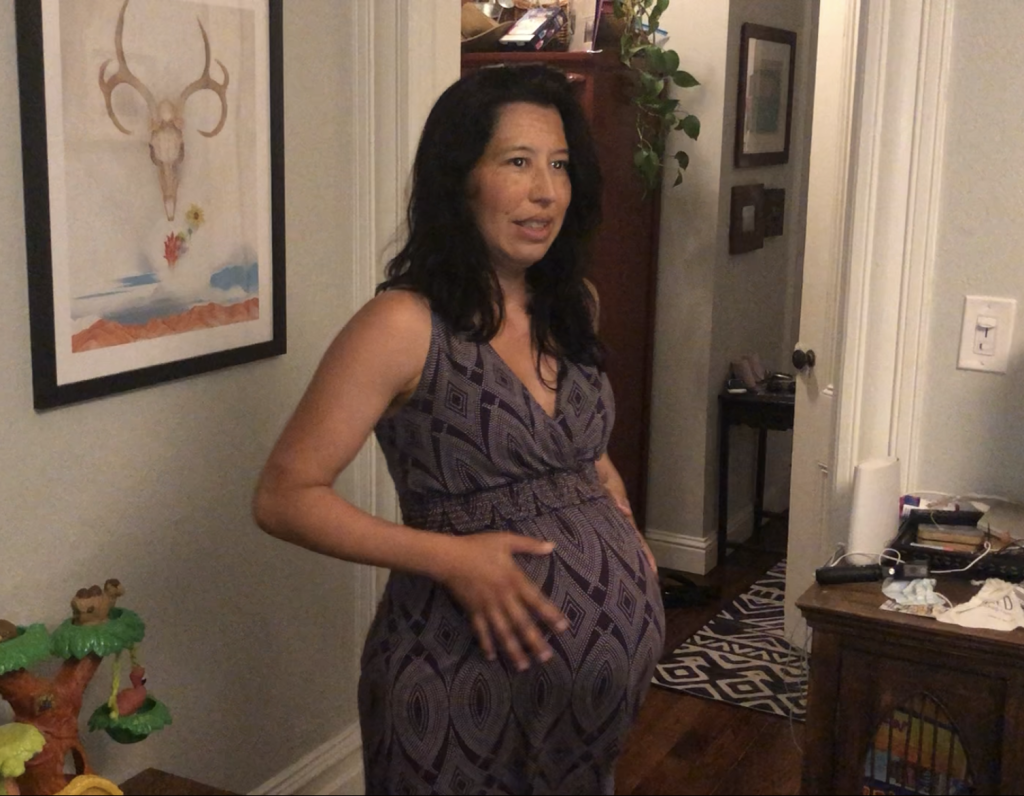 Laboring woman experiencing contractions during a home birth