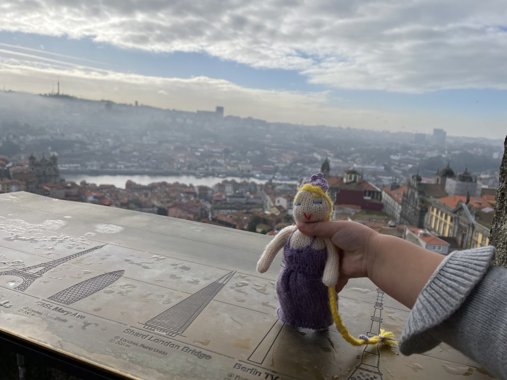 A doll at the top of the Ciegros Tower in Porto Portugal
