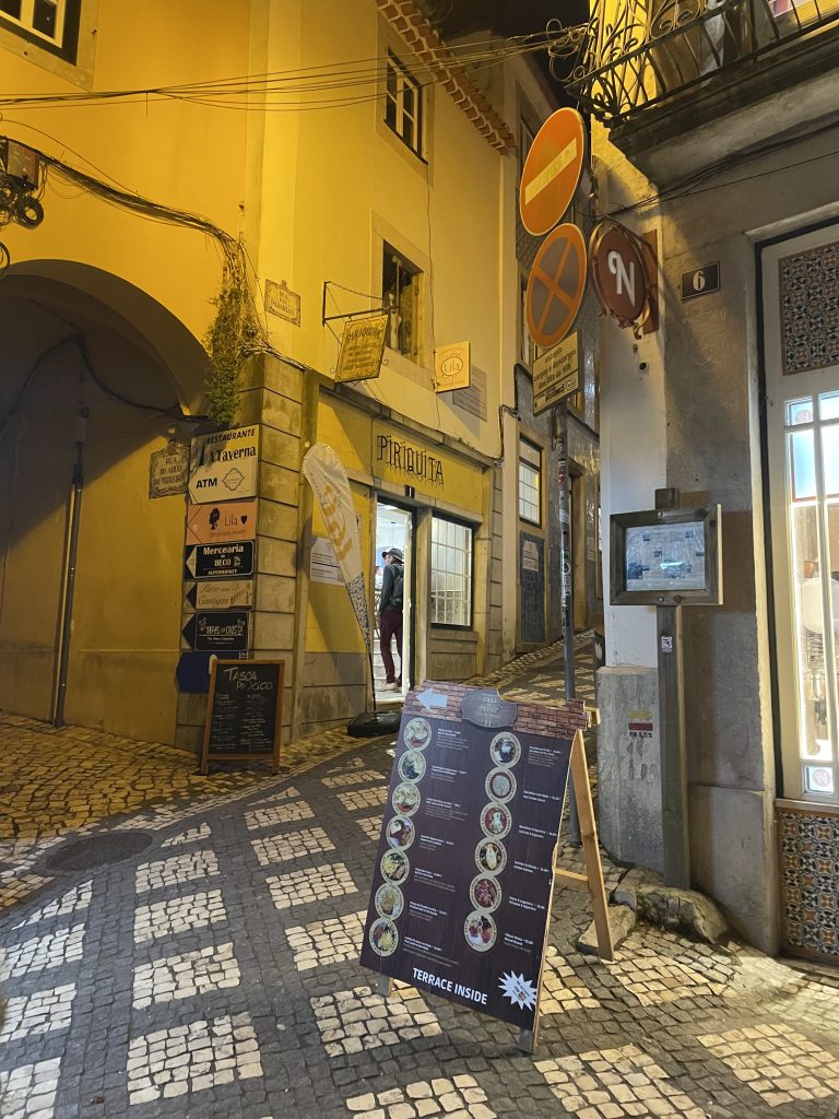 A small alleyway with a sign to Piriquita II Bakery in Sintra Portugal