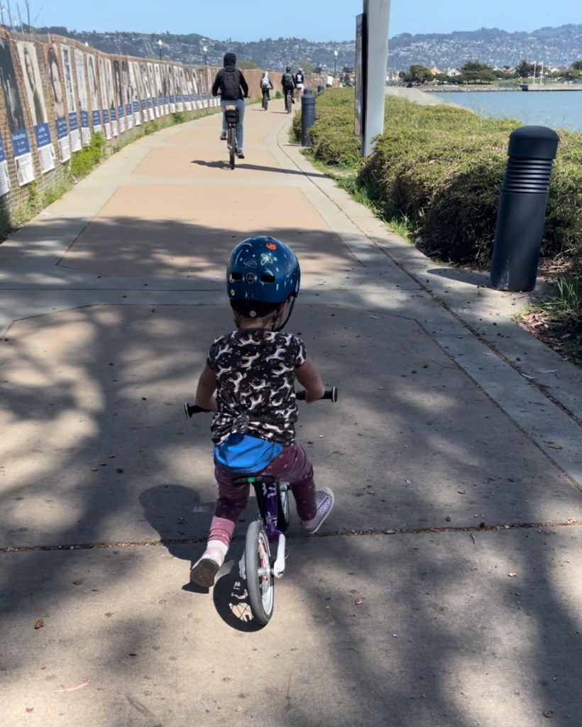 A child practicing on a purple woom 1 bike in Richmond CA