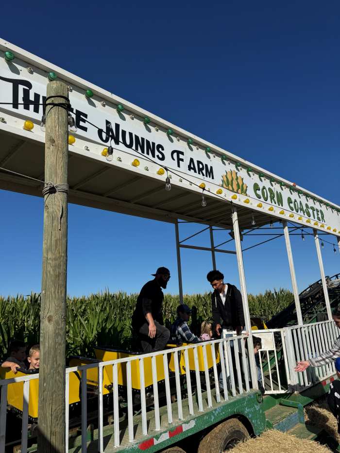 A sign for Three Nunns Farm Corn Coaster in Brentwood, CA