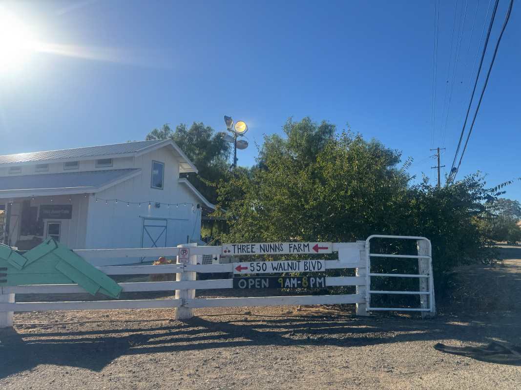 White barn at the entrance to Three Nunns Farm in Brentwood, CA