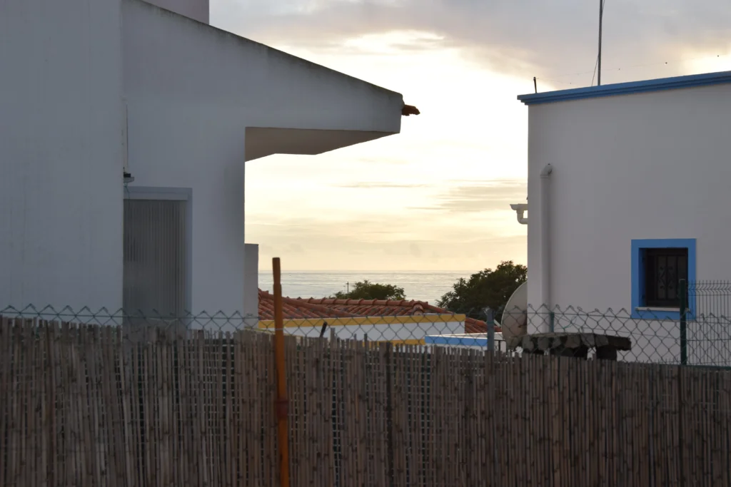 Sunset between two shite buildings in Albufeira, Algarve Portugal